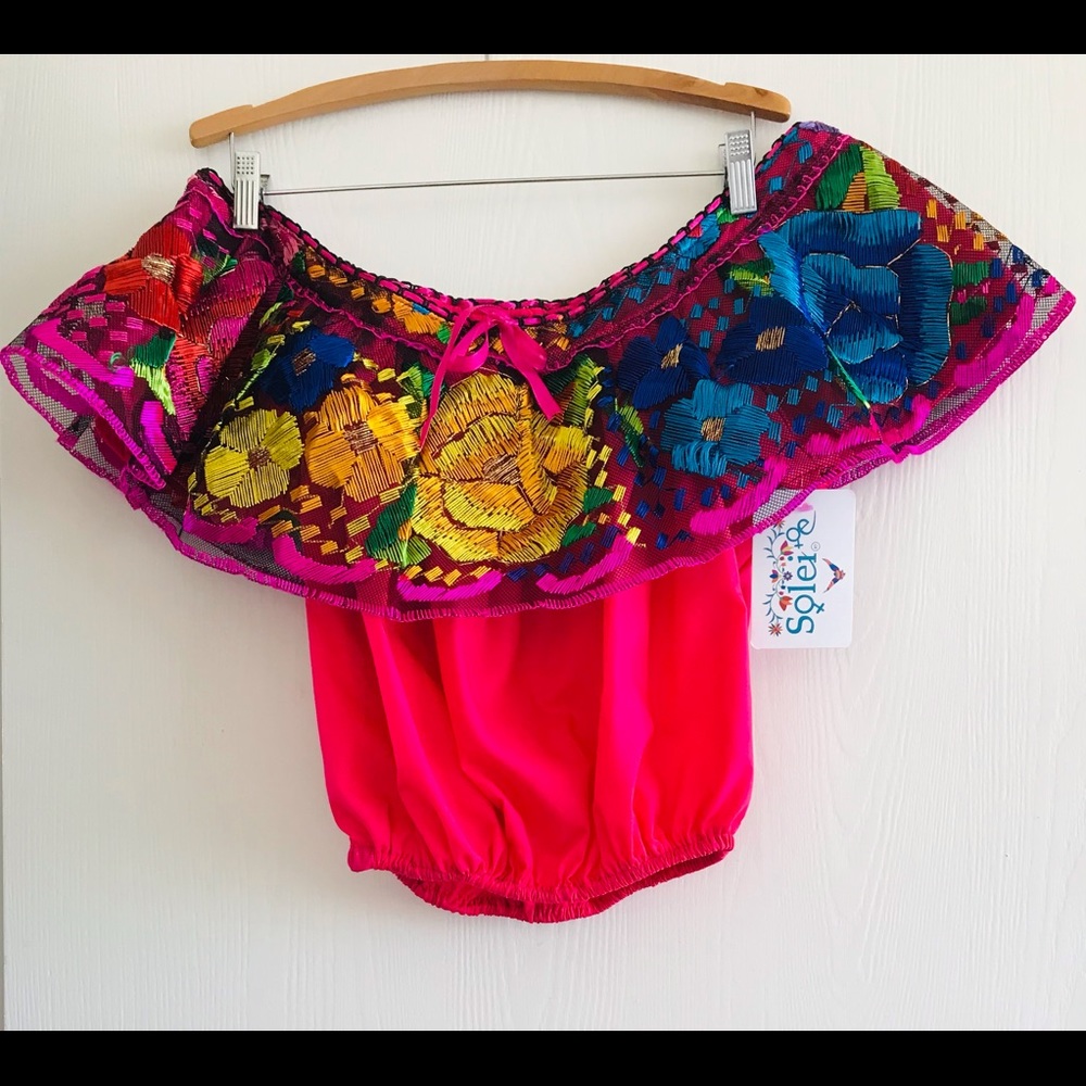 Hand embroidered crop top.